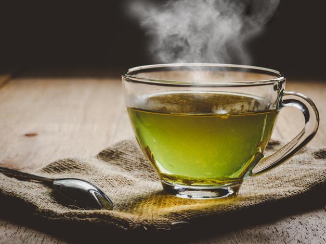 Image showing a cup of green tea and its benefits.